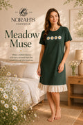 NORAH's Meadow Muse forest green nightdress with four white daisies and cream eyelet lace ruffle hem